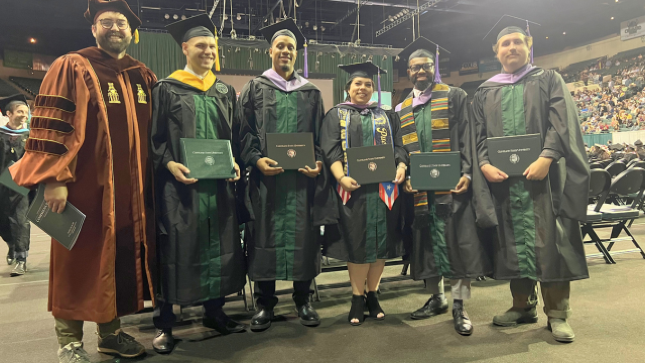 Dr. Tom Hilde and Graduates at Fall 2025 Commencement